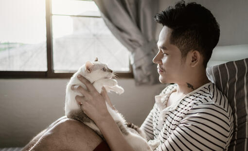 man with cat